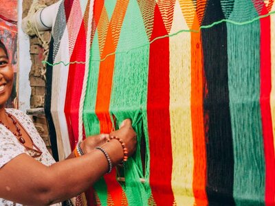 woman smiling in a market