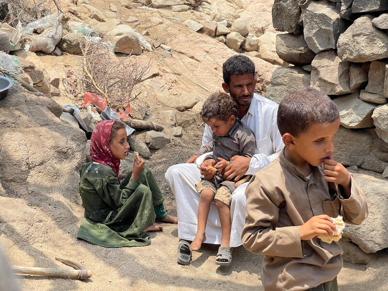 Yemen. Abdullatif, 35, with his children, Fatima,7, Ali, 6, and Jalal,1