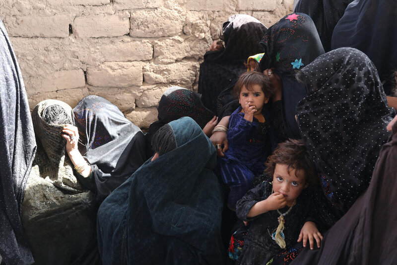 Mothers and children at a nutrition clinic run by WFP and UNICEF near an IDP camp on the outskirt of Herat.