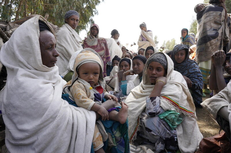 WFP is supporting more than 650,000 displaced people and host community members in seven districts of North Gondar, in Ethiopia, with over 11,000 mt of food through relief distributions each month. Photo: WFP/Claire Nevill