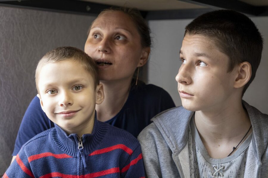 Liubov and her sons displaced in Poltava. Photo: WFP/Reem Nada  ​