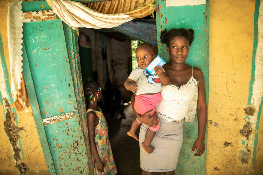 Dozimène in Limbé Haiti with her child. Photo: Theresa Piorr