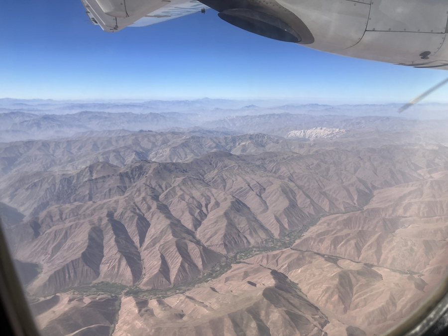 上空から見える広大な山々と山間の豊かな緑。Photo: WFP