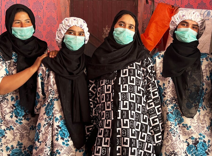 Bibi Sharifa (second from R) and two of her sisters, along with her sister-in-law Khal Jan (L), who is part of their baking business. Photo: WFP/Rana Deraz 