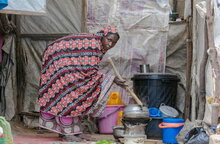 Photo: WFP/Oluwaseun Oluwamuyiwa, A woman preparing a meal for her family.